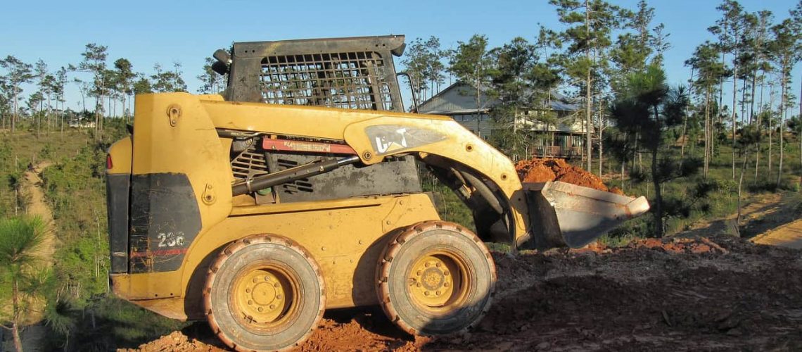 track loader, rated operating capacity, uneven terrain